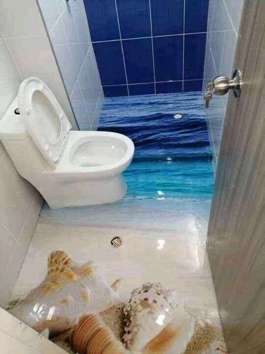 Baño reformado por Dunamis con suelo decorativo y alicatado a dos tonos